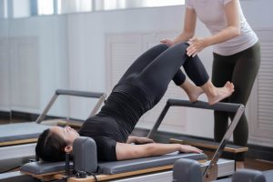 Read more about the article Mat, Reformer, or Chair? Choosing the Right Pilates Style for Your Body